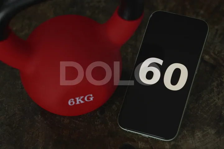 60-Second Workout Timer Beside a Red Kettlebell